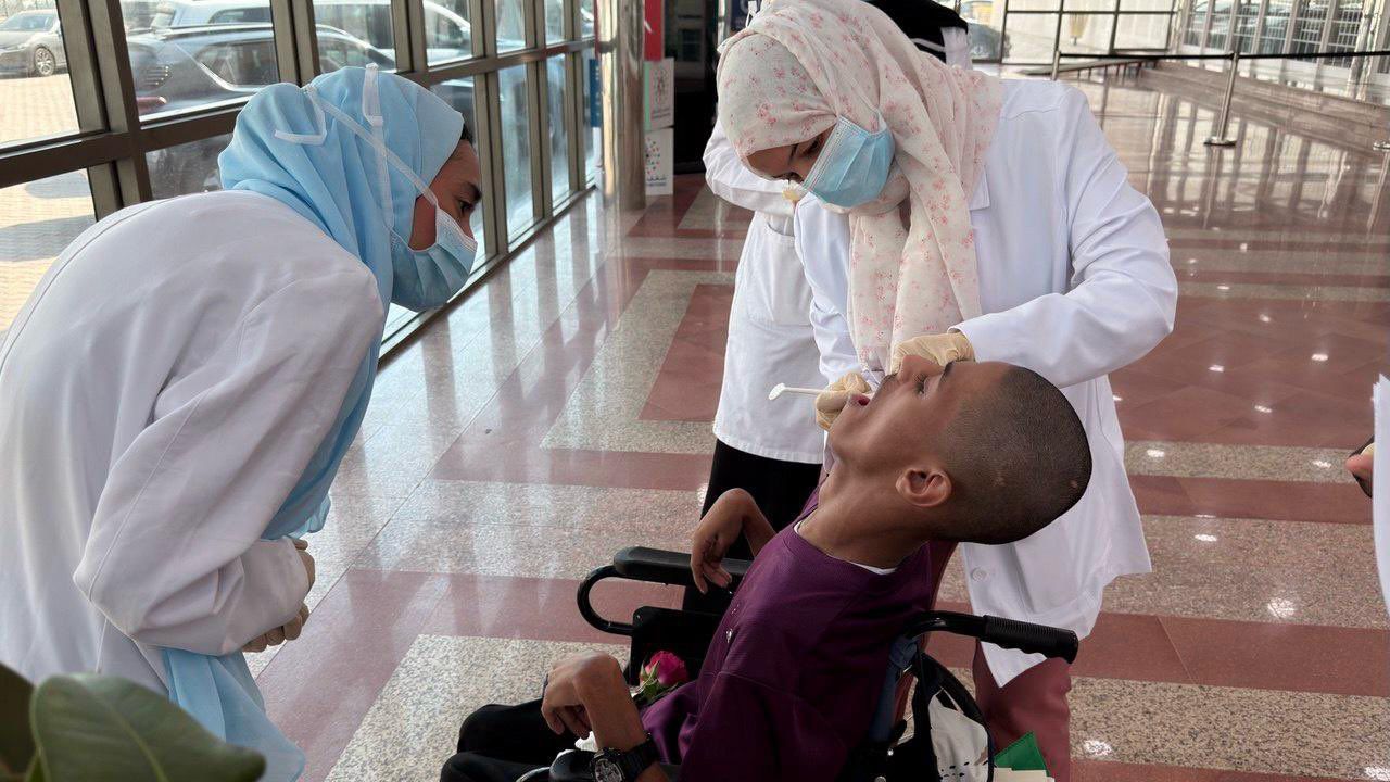 جانب من مشاركة الكلية في برنامج دعم وتمكين الطلاب من ذوي الإعاقة