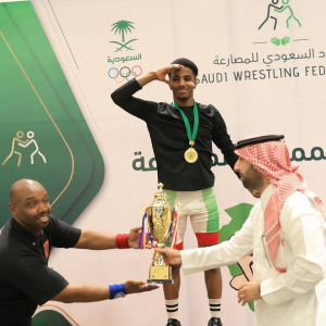 Barahmah Wins the First Place and the Cup for Best Player in the Open Roman Wrestling Championship of the Kingdom