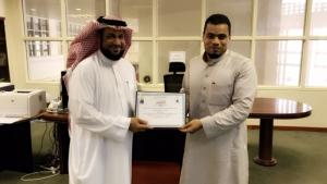 Hail University Hands out Appreciation Certificates to Library Employees Wael Adil and Yassir Al-Malki