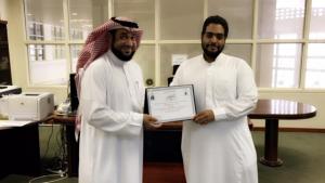 Hail University Hands out Appreciation Certificates to Library Employees Wael Adil and Yassir Al-Malki